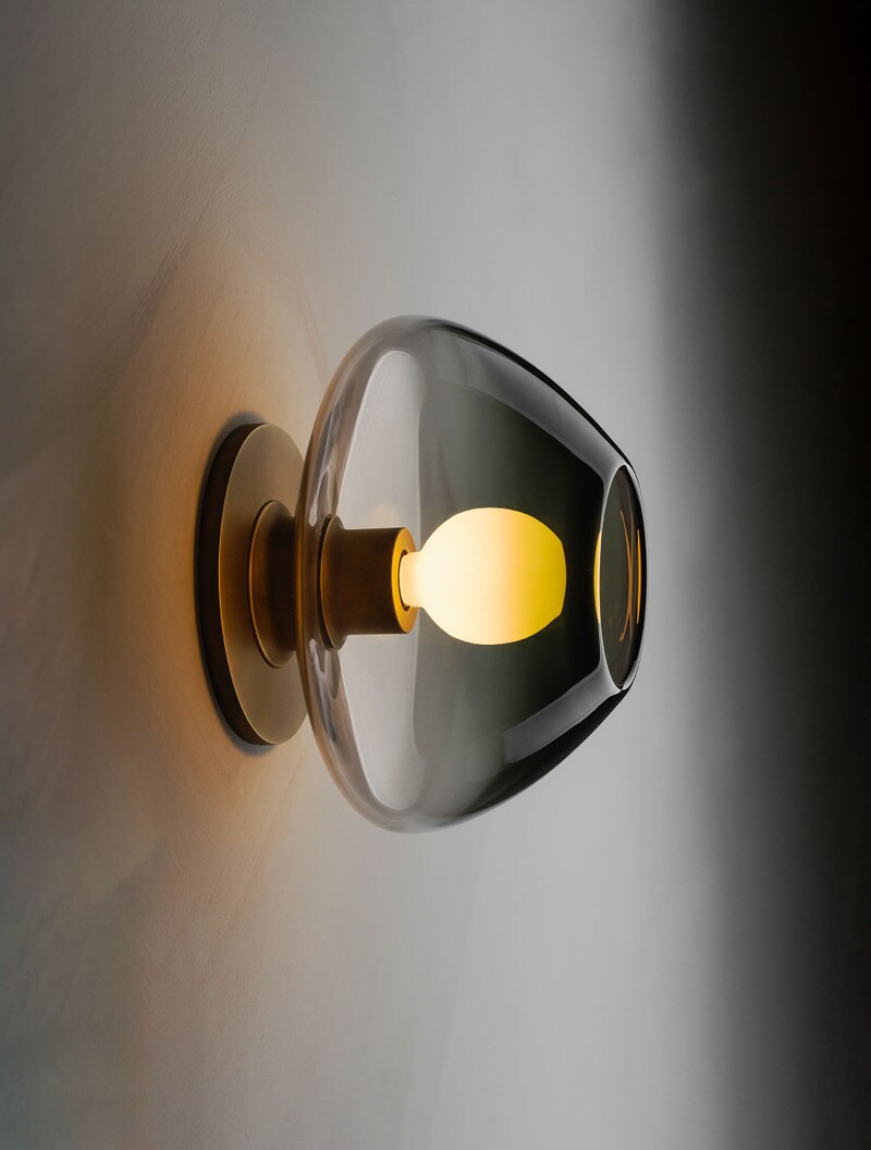 Molten Sconce 7.5" shown in Heritage, and Clear to Smoked Gradient Glass